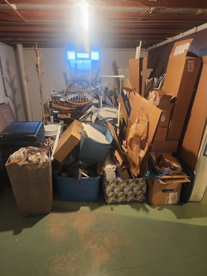 Roll-off dumpster container at job site for 2 Yard Dumpster Rental in Baltimore